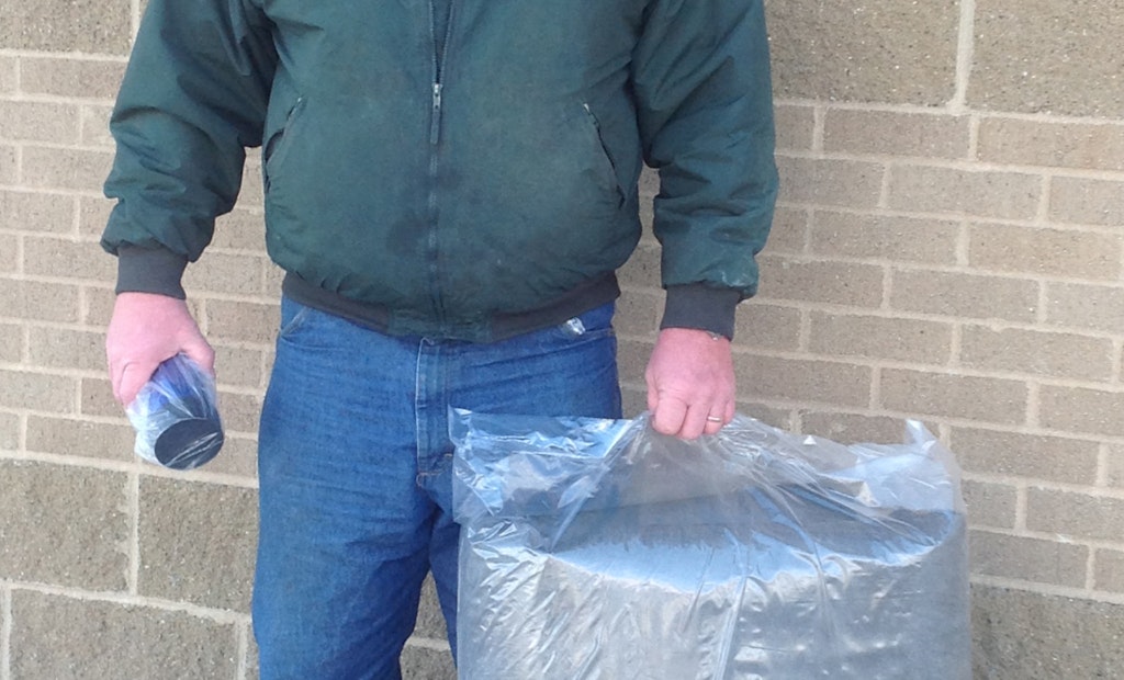 Scott Ende wins MJM septic system blanket at Expo